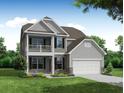 Two-story craftsman style home with gray siding, stone accents, and a balcony at 120 Palfrey Dr, Ridgeville, SC 29472