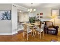 Bright dining area with hardwood floors and glass table at 1309 Pelican Watch Villas, Seabrook Island, SC 29455
