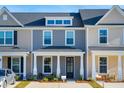Townhouses with front porches and driveways at 205 Abercom Place Dr, Moncks Corner, SC 29461