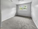 Spacious bedroom with neutral walls and new carpeting at 219 Owens Dr, Summerville, SC 29485