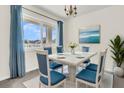 Bright dining room with ocean view at 100 Mariners Cay Dr, Folly Beach, SC 29439