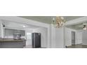 Gray kitchen with stainless steel appliances and a wood countertop at 1586 Highway 15, Saint George, SC 29477