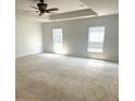 Large main bedroom with neutral walls, carpet and two windows at 506 Holiday Dr, Summerville, SC 29483