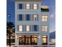 Elegant building with ground floor retail and upper residential units at 284 Meeting St # 201, Charleston, SC 29401