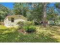 Single wide mobile home with large backyard and satellite dish at 137 Thelma Dr, Summerville, SC 29485