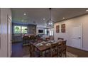 Open concept dining room with farmhouse table and kitchen views at 412 Oak Hammock Ct # 53, Johns Island, SC 29455