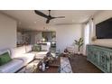 Bright living room featuring comfortable seating and large windows at 412 Oak Hammock Ct # 53, Johns Island, SC 29455