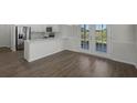 Modern kitchen features stainless steel appliances and an island at 426 Grove End Rd, Moncks Corner, SC 29461