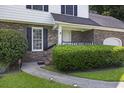 Front entrance with walkway and landscaping at 5 Avon Ct, Charleston, SC 29407