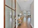 Bright entryway with hardwood floors and a console table at 361 Wappoo Trace Ln, Summerville, SC 29486