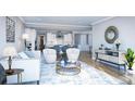 Open living room with white couch and view into kitchen at 1668 Siloh Dr # 470, Mount Pleasant, SC 29466