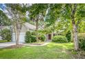 One-story home with a two-car garage and nicely landscaped yard at 2851 Curran Pl, Mount Pleasant, SC 29466