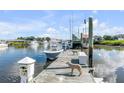 Wooden dock with boats and wildlife at 228 Haddrell St, Mount Pleasant, SC 29464