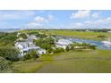Wide aerial view of waterfront homes and marsh at 228 Haddrell St, Mount Pleasant, SC 29464