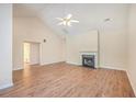 Living room with vaulted ceiling, fireplace and hardwood floors at 195 Fox Squirrel Run, Summerville, SC 29483