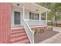 Front porch with brick steps and white railing at 195 Fox Squirrel Run, Summerville, SC 29483