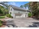 Attached two-car garage with additional storage space at 2340 Marsh Hen Dr, Seabrook Island, SC 29455