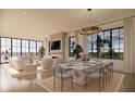 Spacious living room with fireplace and water views at 3209 Marshall Blvd, Sullivans Island, SC 29482