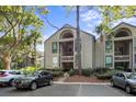 Well-maintained exterior with ample parking and lush landscaping at 1351 Pelican Watch Villas, Seabrook Island, SC 29455