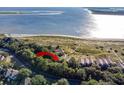 Aerial view showcasing the property's location near the beach and waterway at 1351 Pelican Watch Villas, Seabrook Island, SC 29455