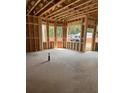 New construction living room framing with large windows at 108 S Williams Dr, Moncks Corner, SC 29461