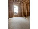 Unfinished bedroom with window in new house under construction at 108 S Williams Dr, Moncks Corner, SC 29461