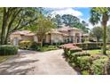 House exterior with circular driveway at 6036 Postell Dr, Ravenel, SC 29470