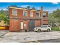 Brick building with parking and potential for renovations at 115 Wentworth St, Charleston, SC 29401