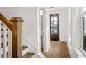 Bright entryway with stairs and powder room at 423 Grove End Rd, Moncks Corner, SC 29461