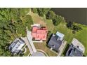 Aerial view showing house, pool, and surrounding neighborhood at 108 N Norfolk Way, Goose Creek, SC 29445