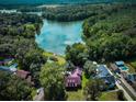 Aerial view of waterfront property and neighborhood at 1813 Albert Storm Ave, Moncks Corner, SC 29461