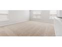 Spacious upstairs bedroom with carpeted floors and multiple windows at 373 Willows Crescent Dr, Moncks Corner, SC 29461