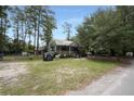 Front view of a single-story home with a yard at 316 Haynes St, Walterboro, SC 29488