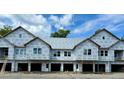 New construction townhome building with two-car garages at 420 Carolina Cherry Ct # 204, Charleston, SC 29414