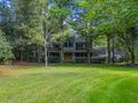 Two-story house with wrap-around porch and a large green lawn at 200 Old Postern Rd, Summerville, SC 29483