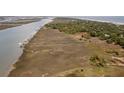 Expansive aerial view of waterfront property at 218 E Huron Ave, Folly Beach, SC 29439