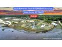 Aerial view of a 3.46-acre property in Johns Island, featuring a house and lush greenery at 000 Remington Trl, Johns Island, SC 29455