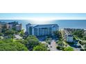 Oceanfront condo complex with ample parking and lush landscaping at 9002 Palmetto Dr # 512, Isle of Palms, SC 29451