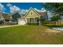 Charming house with boat and American flag at 513 Abigail St, Moncks Corner, SC 29461