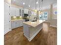 Modern kitchen with island and stainless steel appliances at 3699 Shutesbury St, Mount Pleasant, SC 29466