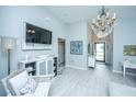 Living room with comfy seating and large TV at 3853 Tupelo Branch Row, Mount Pleasant, SC 29429