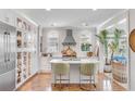 Modern kitchen with stainless steel appliances and white cabinetry at 9844 Haven Loop, Johns Island, SC 29455