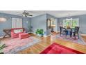 Open living room with hardwood floors and seating at 148 Chadwick Dr, Charleston, SC 29407