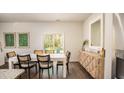 Bright dining room with white table and sliding glass doors at 509 Frutchey Ct, Summerville, SC 29486