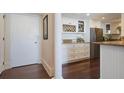 Kitchen features granite countertops and white cabinets at 14 Lockwood Dr # 10D, Charleston, SC 29401