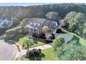 Two story house with driveway and landscaping at 1000 Rivershore Rd, Charleston, SC 29492