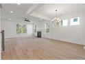 Spacious living room with fireplace and hardwood floors at 2802 Lacy St, North Charleston, SC 29406