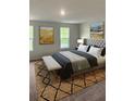 Bright bedroom with comfortable bed and stylish decor at 3956 Treebranch Circle, Mount Pleasant, SC 29429