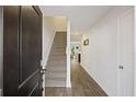 Bright entryway with staircase and hardwood floors at 175 Rosefield Ct, Summerville, SC 29485
