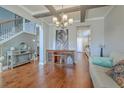 Bright living room with hardwood floors and an open floor plan at 620 Chigwell Springs Ln, Summerville, SC 29486